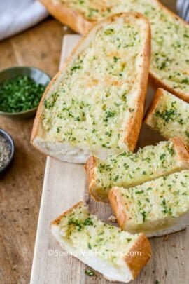 Sliced Homemade Garlic Bread on a cutting board