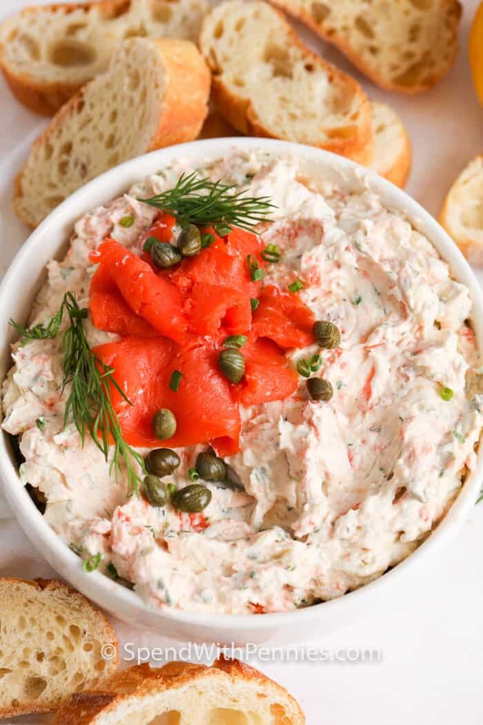 closeup of Smoked Salmon Dip with bread around the bowl