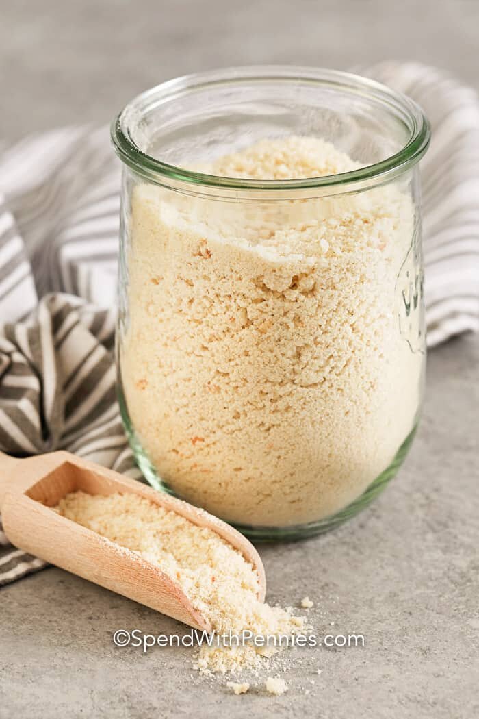 Glass jar of Breadcrumbs with a scoop