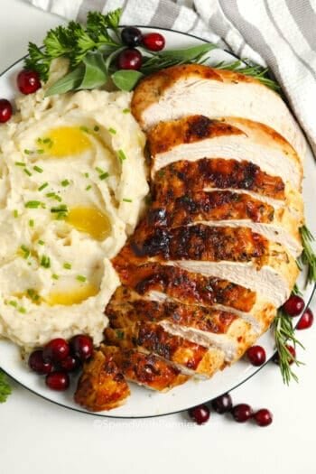 A plate of sliced air fryer turkey breast